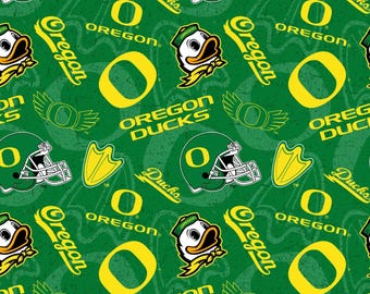 Tela con estampado de los Oregon Ducks, 100% algodón, tono sobre tono.