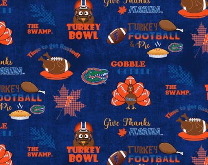Florida Gators Fabric 100% Cotton University of Florida Turkey Bowl Thanksgiving.  Perfect for tablecloth, bibs, dog bandana, and more!