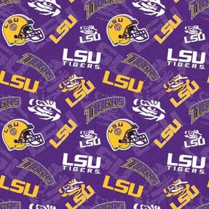 May include: A purple fabric featuring a repeating pattern of yellow LSU football helmets, the text LSU TIGERS in white, the text LSU in yellow, and white tiger head graphics. The design is set against a deep purple background with a subtle texture.