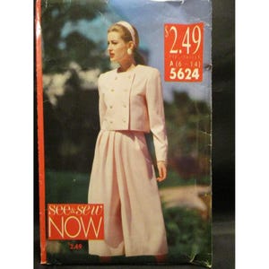 May include: A vintage sewing pattern cover featuring a woman in a light pink suit. The suit includes a double-breasted jacket with gold buttons and a matching skirt. The text "see & sew NOW" is visible.