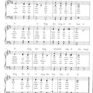 Op de afbeelding: Een blad met muziek met de titel "Abide With Me" en de tekst van een hymne. De muziek is geschreven in een traditionele stijl met viool- en basssleutels en bevat akkoorden en tekst.