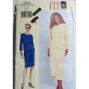 May include: Sewing pattern for a two-piece outfit. The pattern includes a long-sleeved top and a skirt. The top has a cowl neck and the skirt is a-line. The pattern is for sizes A-B-C. The pattern number is 7264.