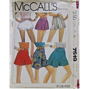 May include: McCall's sewing pattern featuring shorts in various styles. The pattern includes shorts with button details, floral prints, and striped designs. The pattern is for Misses size 10, with a waist size of 25 inches.