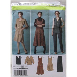 May include: Simplicity sewing pattern 2539 featuring three women's fashion designs. The pattern includes a skirt suit, a jumper dress, and a vest with pants. The pattern size is AA 10, 12, 14, 16, with European sizes 36-44 and French sizes 38-46.