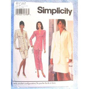 May include: Simplicity sewing pattern 8732 featuring three women's suit designs. The suits are shown in white, pink, and cream colors. The pattern includes the text "easy pocket configuration/la poche facile à faire".
