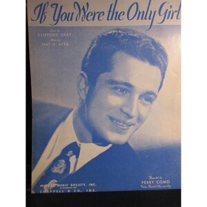May include: A vintage sheet music cover featuring a black and white photo of a man with a light blue background. The title of the song is "If You Were the Only Girl" and the songwriters are listed as Clifford Grey and Nat D. Ayer. The sheet music is credited to Mutual Music Society, Inc. and Chappell & Co., Inc. The sheet music also states that the song was recorded by Perry Como.