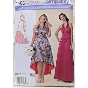 May include: Simplicity sewing pattern 1406 AA featuring halter-neck dresses. The pattern includes a high-low floral print dress, a solid pink gown, and a dress with a white bodice and pink skirt. Size US 10-18.