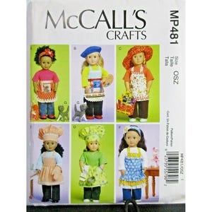 May include: McCall's Crafts MP481 sewing pattern for doll outfits. The pattern includes instructions for making various doll outfits, including aprons, hats, and other accessories. The image shows several dolls wearing the outfits.