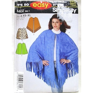 May include: Simplicity sewing pattern 4402, featuring a blue fringed poncho. The pattern includes size A, XS-XL. The packaging also shows illustrations of a leopard print and green poncho.
