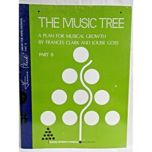May include: A green book cover with the title "The Music Tree" and the text "A Plan for Musical Growth by Frances Clark and Louise Goss" and "Part B". The cover features a stylized green tree with white circles.