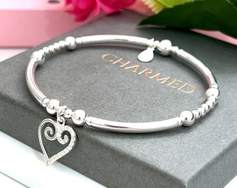 Sterling silver stretch stacking bracelet with a beautiful sparkly heart charm - c.z detail - ladies gift 925