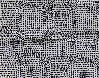 May include: White fabric with a repeating pattern of small, dark blue circles.