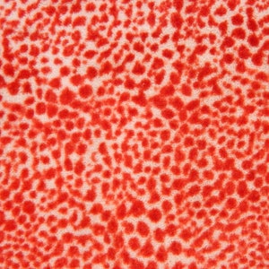 May include: Red and white fuzzy fabric with a leopard print pattern.