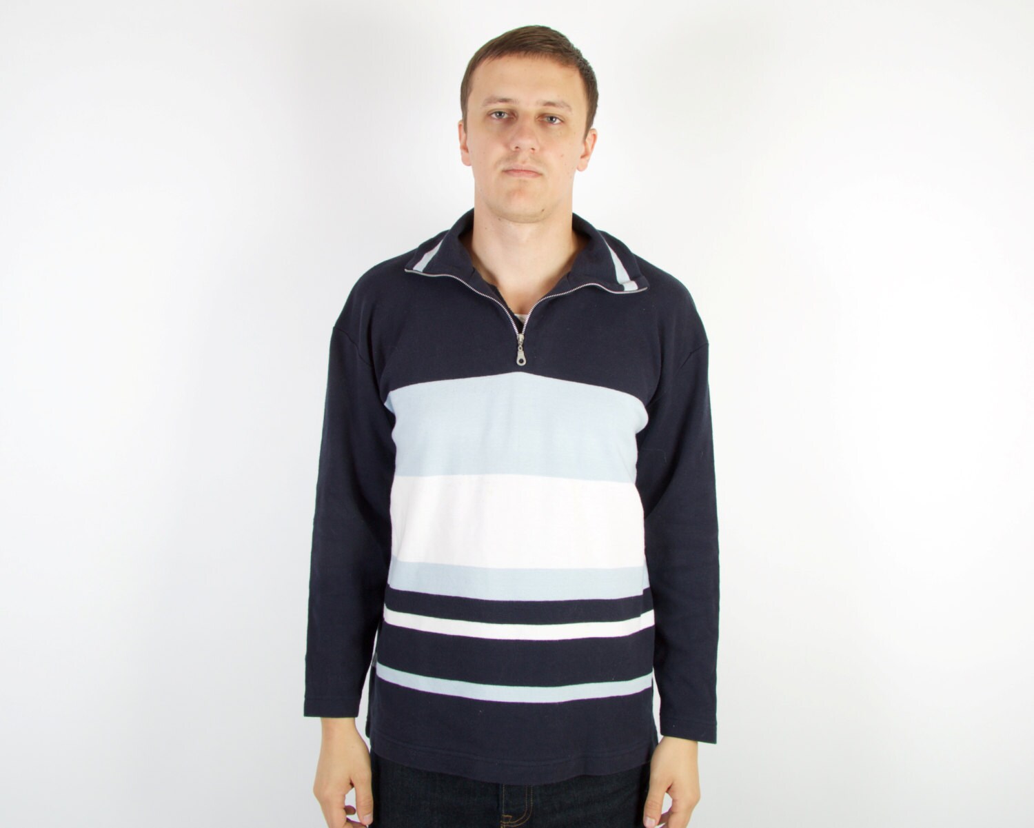 navy blue jumper with white collar