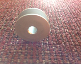 Bobbin, large aluminium, holds at least 18 yards of #20 thread, for use in large shuttles only, will not fit regular shuttles.