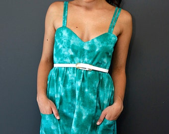 Double Strapped Faded Emerald Green Dress. Size 8 has front pockets. Handmade One of a kind frock and V back. Knee length with room to twirl
