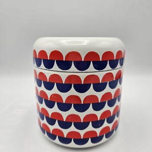 May include: A set of three ceramic nesting bowls in shades of blue, green, and white. The bowls feature a speckled glaze and a simple, modern design. The largest bowl measures approximately 6 inches in diameter.