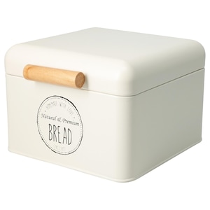 May include: Cream-coloured bread bin with a wooden handle and a circular label that reads "Homemade with Love, Natural & Premium Bread, Since 1977." The box is square with rounded edges, designed for kitchen storage.