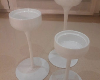 Set of three Ikea Blomster white glass candle holders