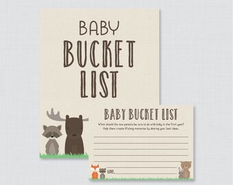 May include: A printable baby shower game card with a brown background and a title that reads "Baby Bucket List". The card features a raccoon, moose, and bear illustration. The text on the card reads "What should the new parents be sure to do with baby in the first year? Help them create lifelong memories by sharing your best ideas."