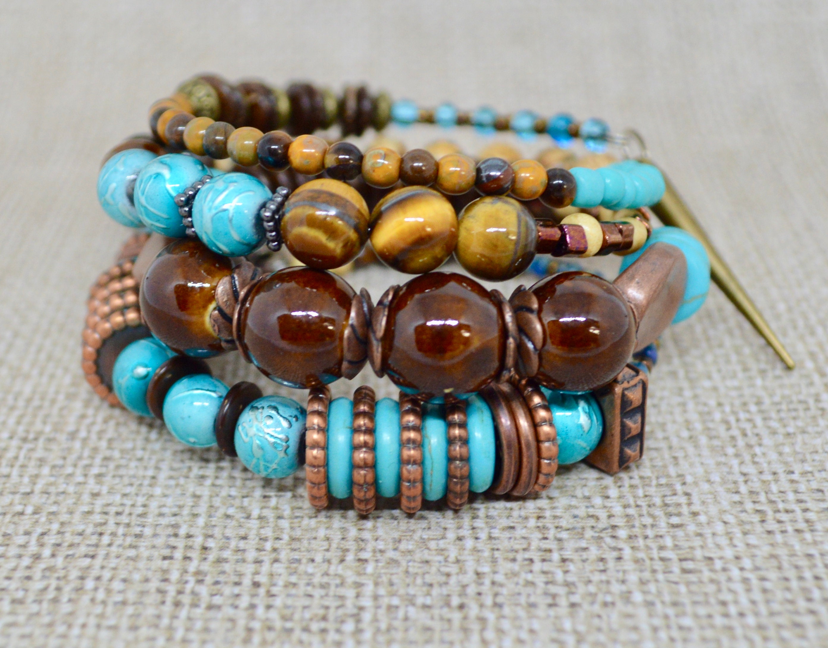 Beaded Memory Wire Bracelet featuring Tropical Denim Blue and Brown Wood  Beads and Flower Charm