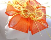 Fascinator hat, orange flower hatinator