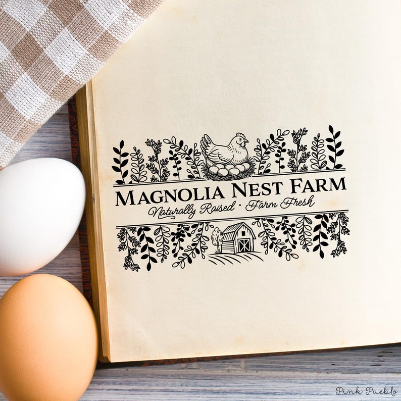 Custom rubber stamp impression reading "Hen & Harvest Farm – Naturally Raised · Farm Fresh" stamped in black ink on the inside lid of a green egg carton, shown with a dozen fresh brown eggs. Perfect for backyard chicken keepers, small farms, and handmade packaging.