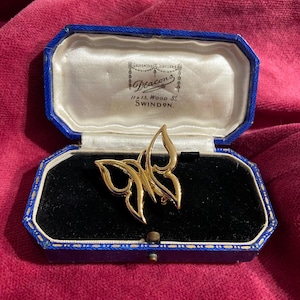Vintage butterfly brooch, gold plated / gold tone pin with roll over clasp