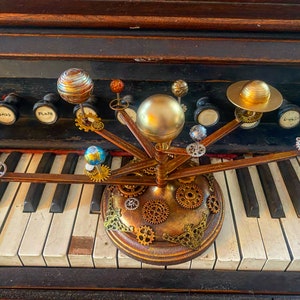 Orrery Inspired Solar System Model with Wooden Base and Decorative Accents image 1