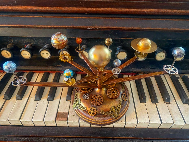 Orrery Inspired Solar System Model with Wooden Base and Decorative Accents image 1