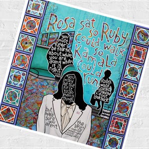 May include: A square art print featuring a collage of silhouettes and text. The text reads: Rosa sat so Ruby could walk so Kamala could run. It includes quotes from Rosa Parks, Kamala Harris, and Ruby Bridges, with a border of colorful geometric patterns.