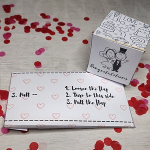 Cartão de festa surpresa Bombfetti. Explodindo desejos de casamento de confete, vamos comemorar o cartão de chuva de confete, Festa em uma caixa. Baixar PDF.
