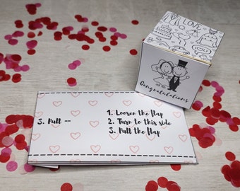 Tarjeta de fiesta sorpresa Bombfetti. Deseos de boda de confeti explosivos, celebremos la tarjeta de lluvia de confeti, Fiesta en una caja. Descargar PDF.