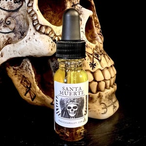 Santa Muerte oil - witchcraft oil - conjure oil - magical oil by Rev Roy