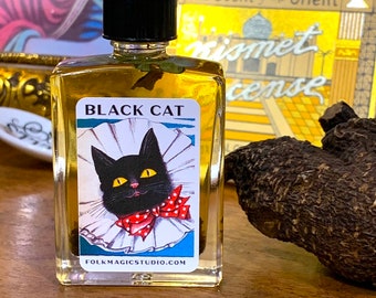 Black Cat Conjure Oil – for power and allure - hoodoo - witchcraft - pagan