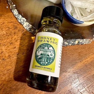 Money Drawing oil - hoodoo oil - conjure oil - witchcraft - pagan