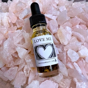Love Me oil - witchcraft oil - conjure oil - magical oil by Rev Roy