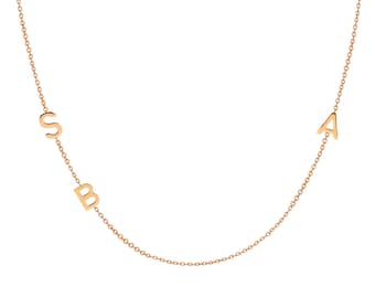 triple 14k gold asymmetrical initial necklace