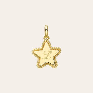 May include: Gold star charm with a beaded edge and the letter "L" engraved in the center.