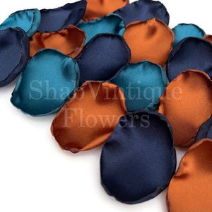 Decorate your Bridal Shower Tables with these beautifully handcrafted satin flower petals. This mix includes Navy Blue, Teal, and Copper colors.