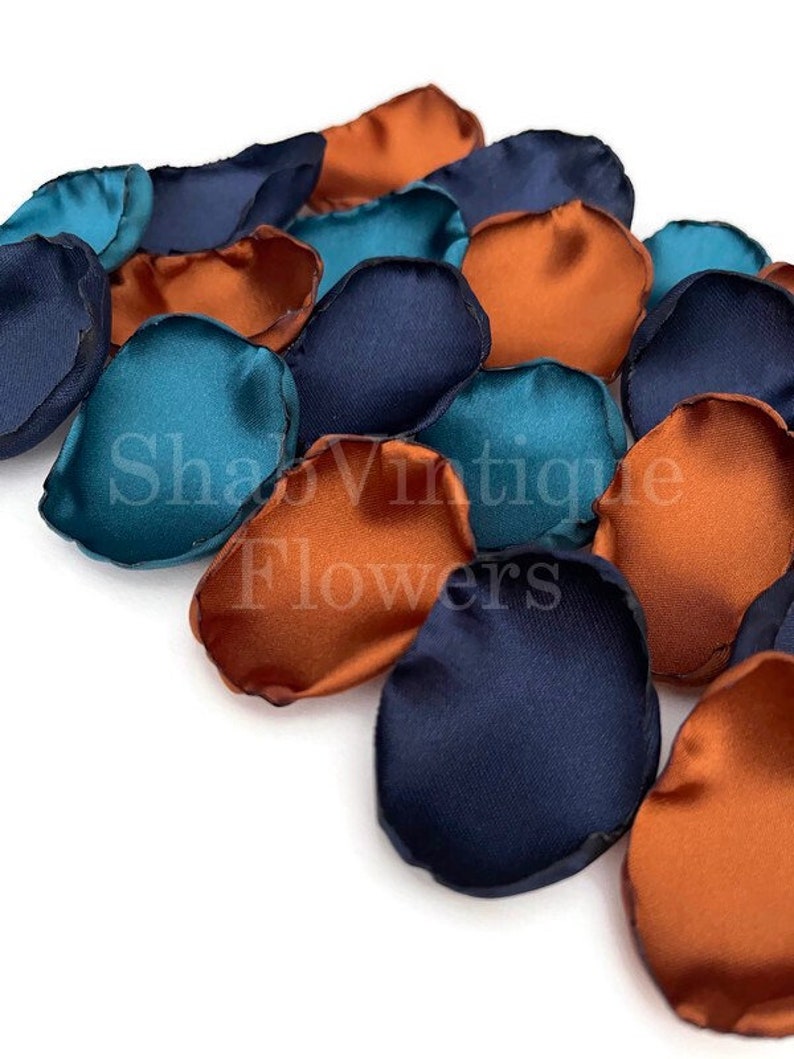 Decorate your Bridal Shower Tables with these beautifully handcrafted satin flower petals. This mix includes Navy Blue, Teal, and Copper colors.