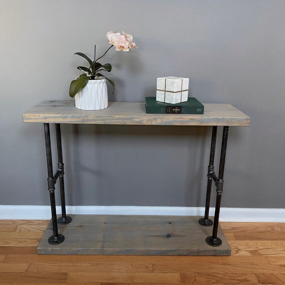 Pipe on sale sofa table