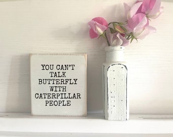 You can’t talk butterfly with caterpillar people. Small wood block. Inspirational daily reminder quotes