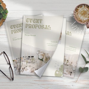 May include: Three event proposal brochures with a white background and a beige and brown color scheme. The text on the front of the brochures reads "EVENT PROPOSAL" and includes the name "Morgan Maxwell".