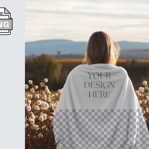 May include: A white blanket with the text "YOUR DESIGN HERE" printed on it. The blanket is draped over a person standing in a field of white cotton plants.