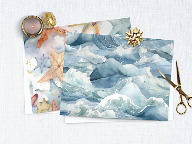 May include: Two sheets of wrapping paper with different designs. One sheet features a blue and white watercolor pattern of ocean waves. The other sheet features a pattern of starfish and seashells in shades of orange, brown, and blue.