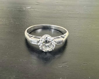 Beautiful Solitaire and Baguette Diamond ring, Art Deco Original.
