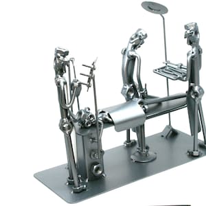 Handmade Ankle orthopedic surgeon nuts and bolts sculpture. Figurative sculpture art, Scrap metal art Medical student gift, Welded metal art
