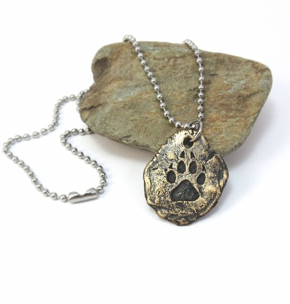 solid gold wolf pendant