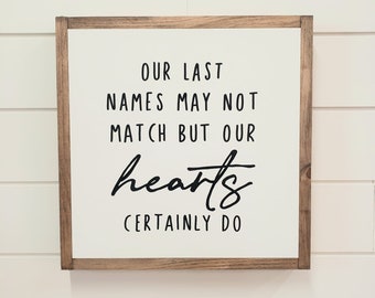 Our last names may not match but our hearts certainly do Wood Sign